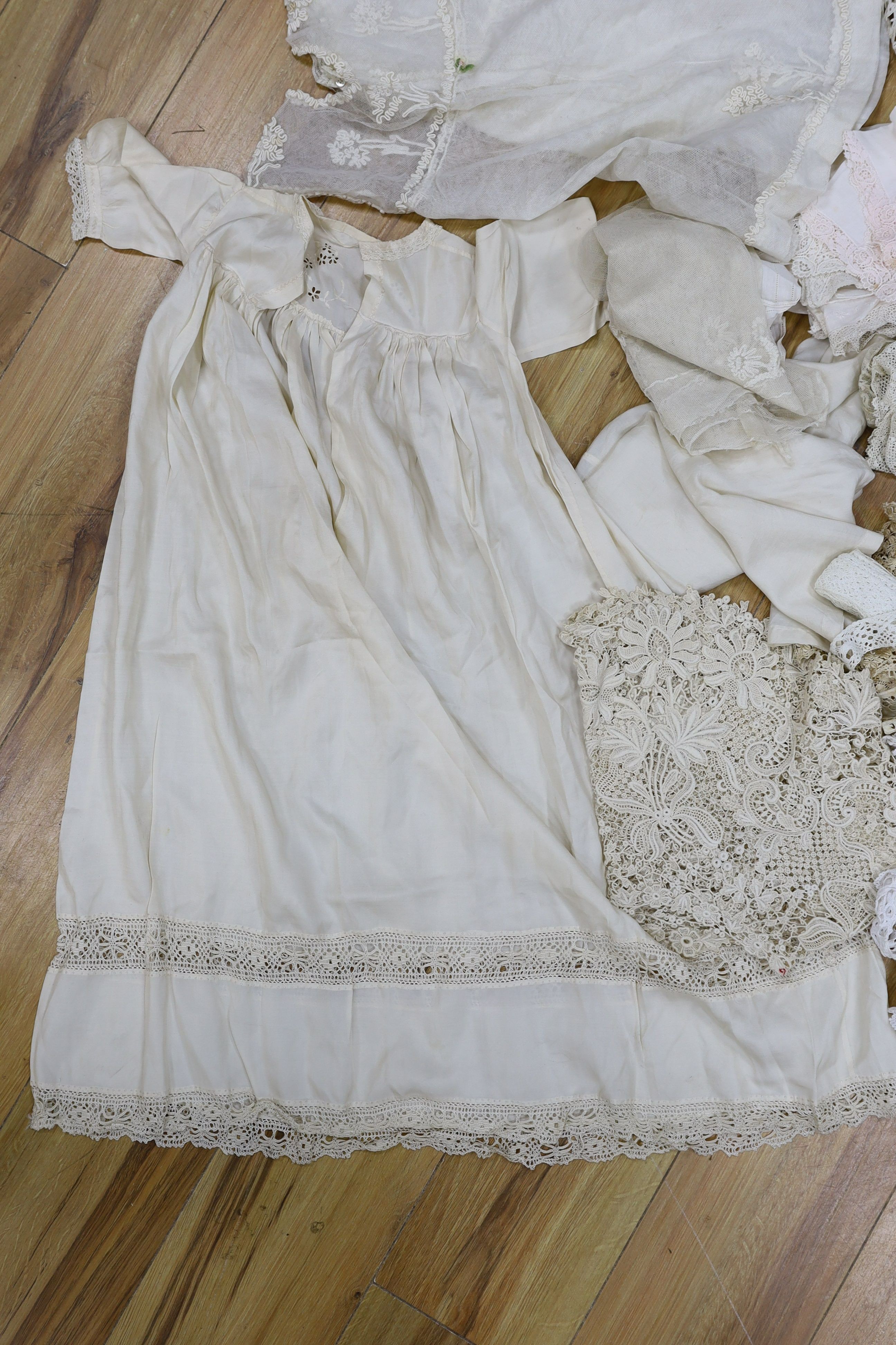 A silk Maltese bobbin lace jabeau, various lengths of lace, a mixture of chemical laces, stoles, a baby’s dress and a collection of hankies